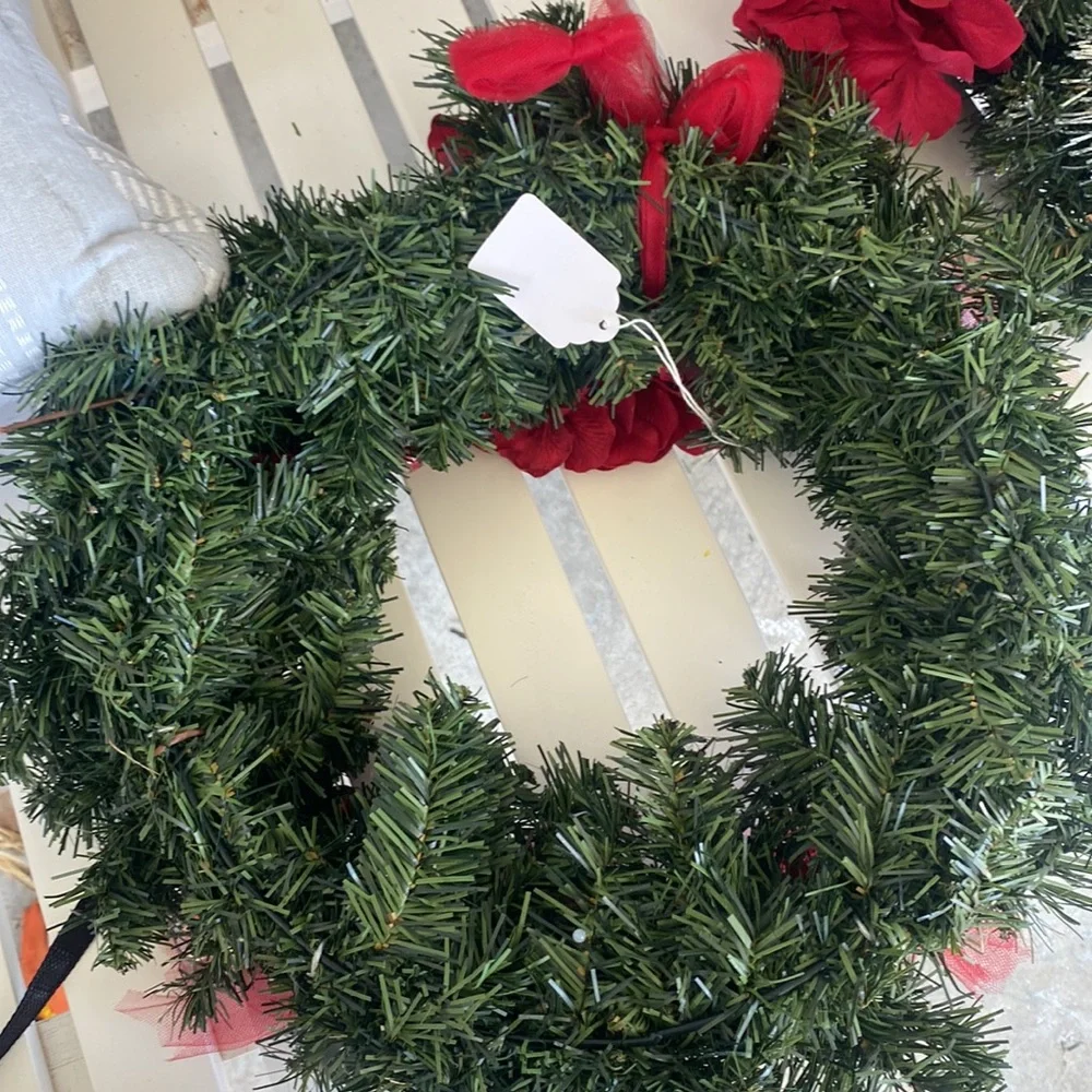 Evergreen Faux Wreath Trimmed with red accents and pine ones